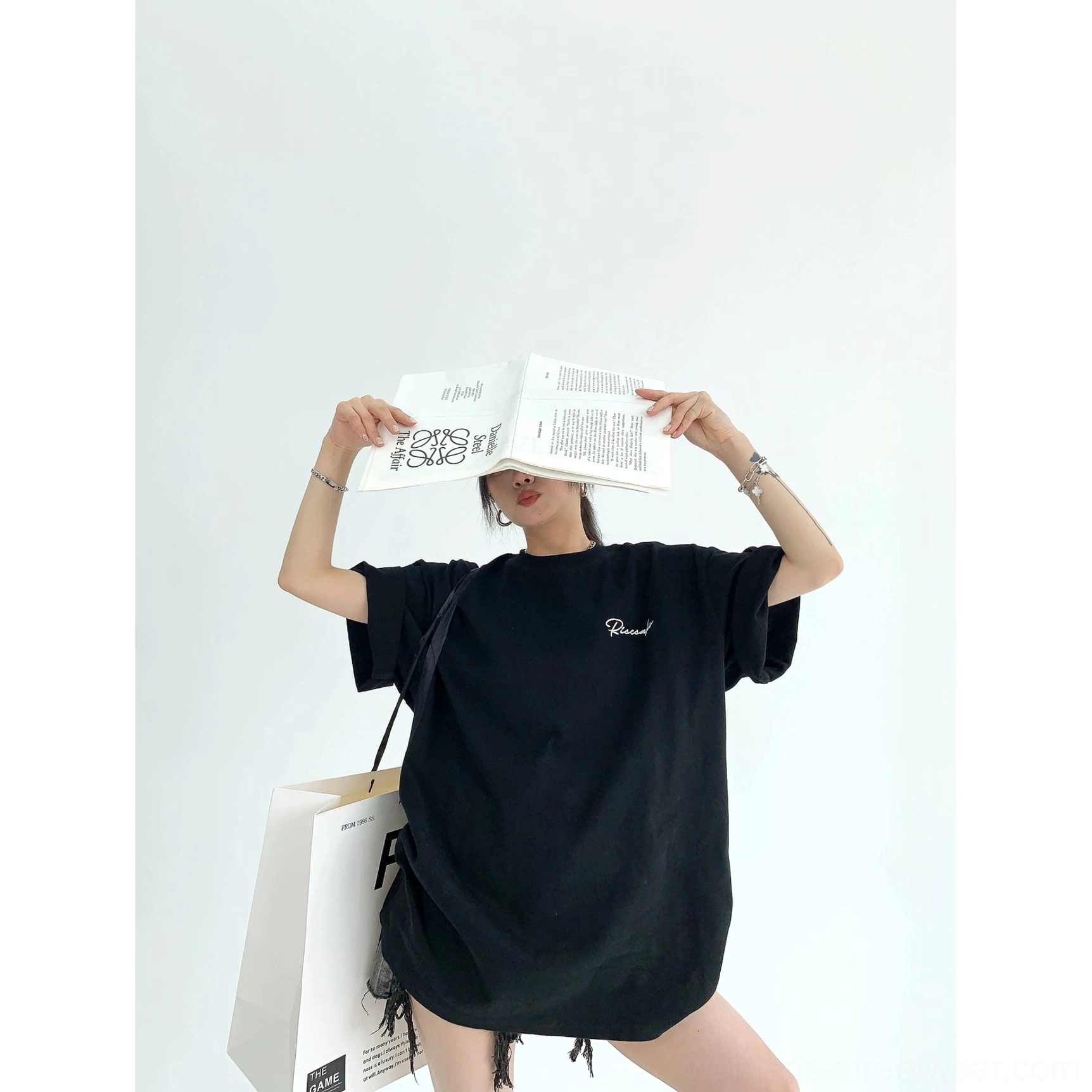 Oversized lace panel script streetwear tee detailed product view with embroidered chest and floral back appliqué