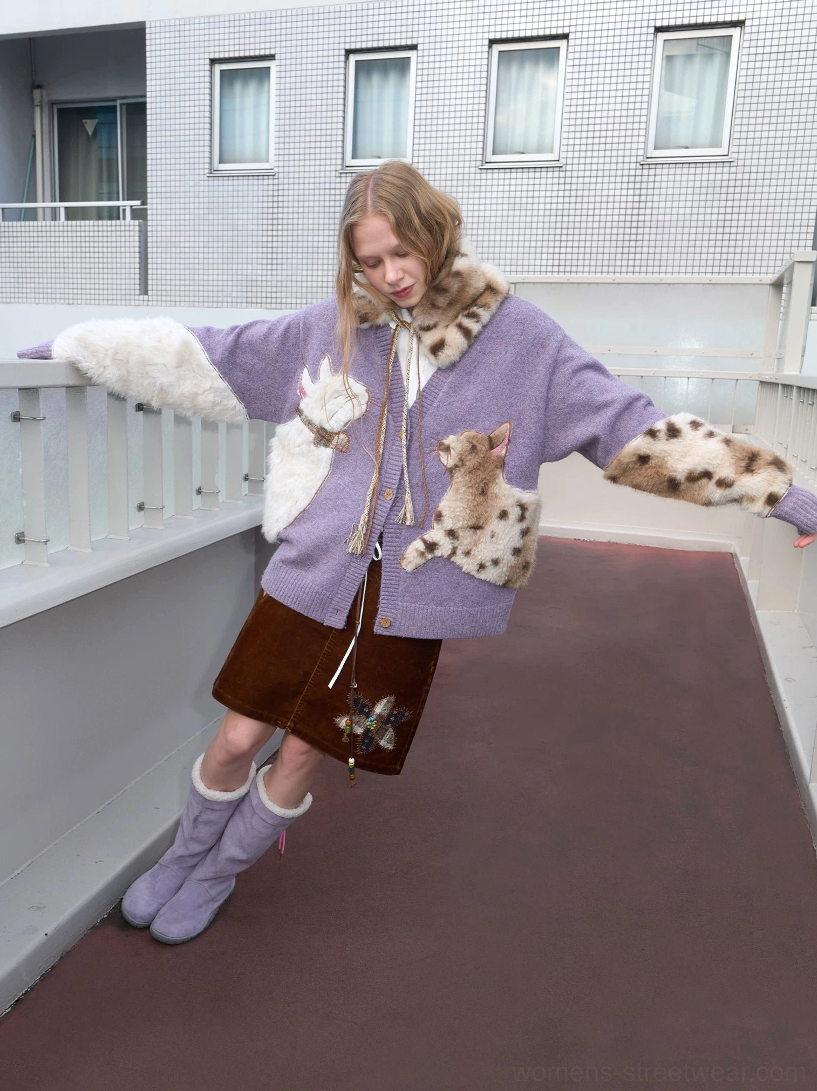 Oversized lavender fuzzy cat cardigan side view displaying plush sleeve appliques, relaxed knit fit, and playful Korean-inspired streetwear styling