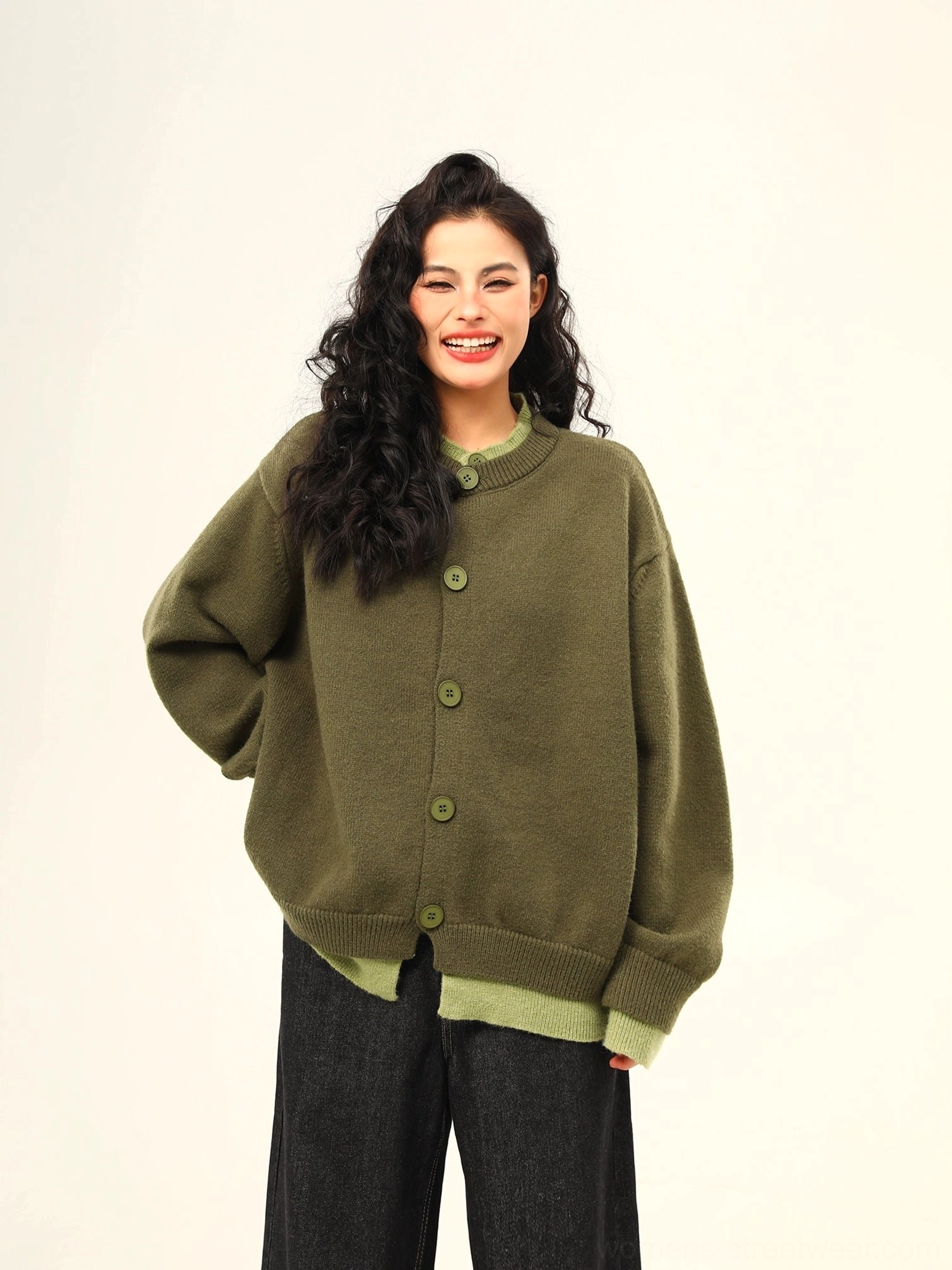 Army green oversized button front knit cardigan with matching layered cuffs and relaxed dropped shoulders