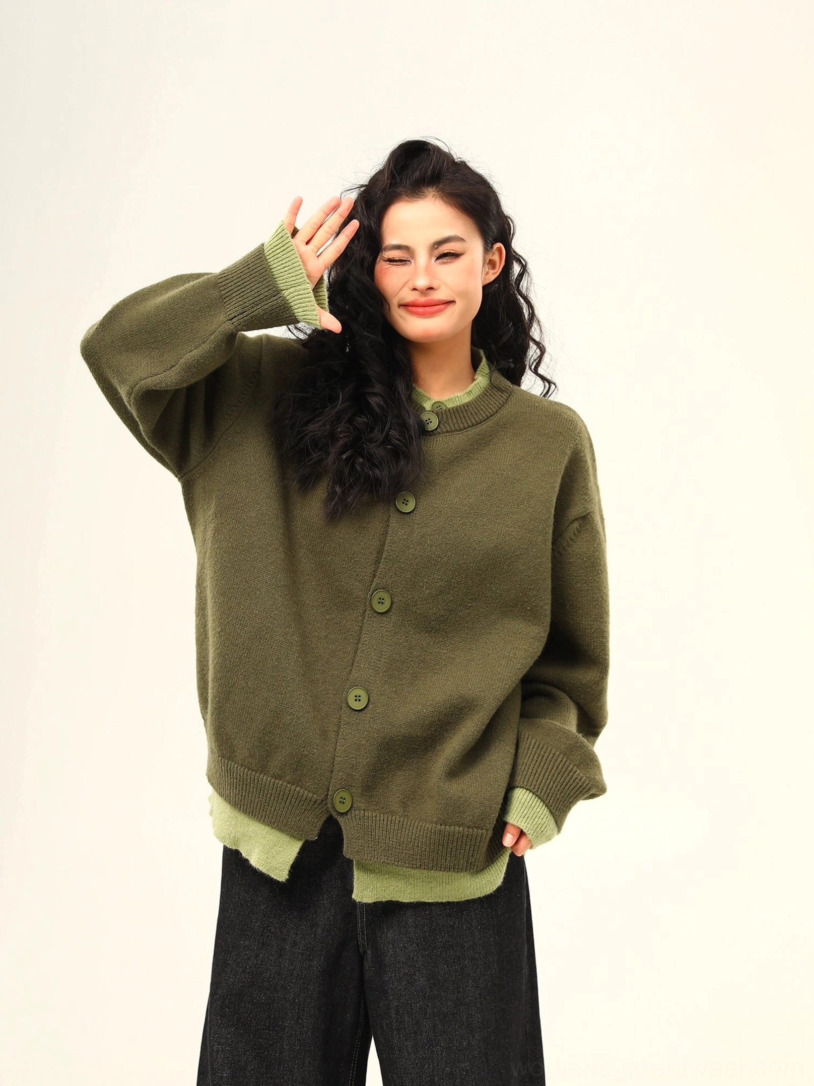 Army green oversized layered hem button knit cardigan styled with black wide leg pants in Korean streetwear outfit