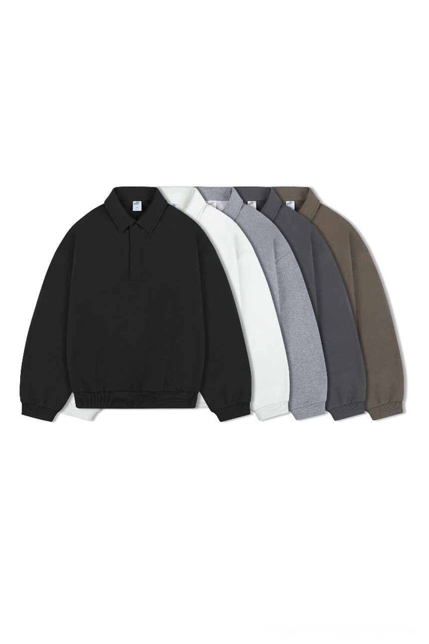 Five color collection of oversized long sleeve polo sweaters in black, white, heather gray, charcoal gray, and dark brown
