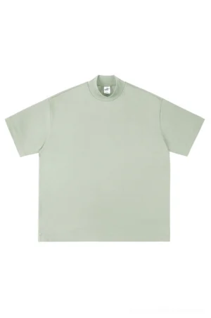 Sage light green oversized mock neck cotton t-shirt with dropped shoulders and relaxed boxy streetwear fit