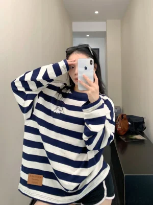 Oversized navy speckled stripe puppy embroidered long sleeve tee front mirror outfit view