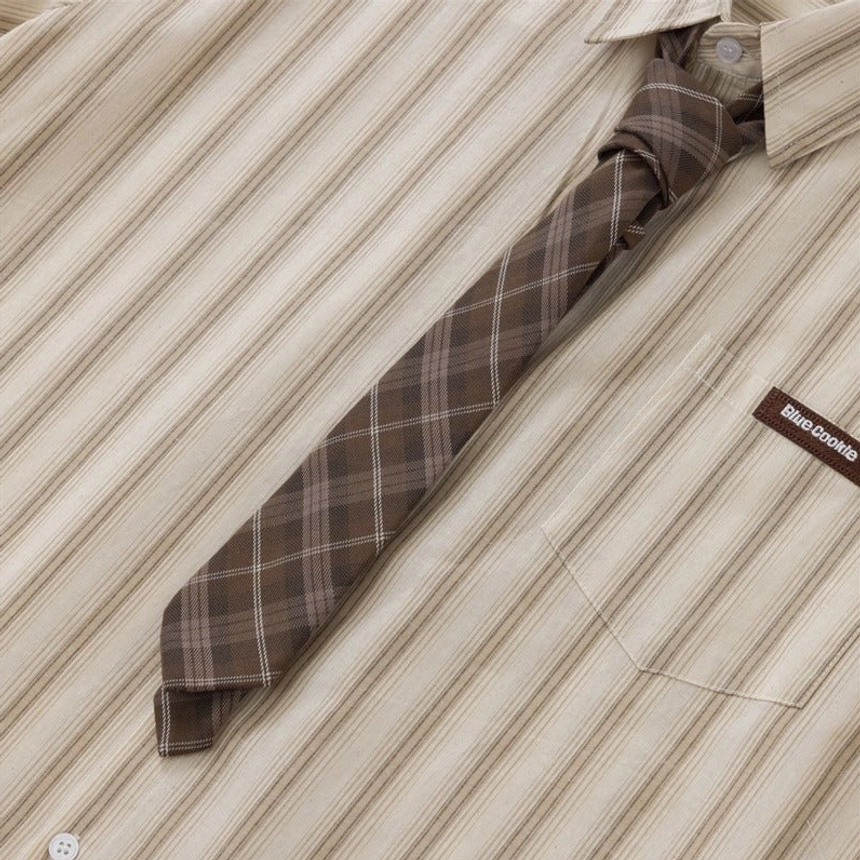 Oversized pinstripe button-up shirt with plaid tie in apricot beige colorway streetwear product view