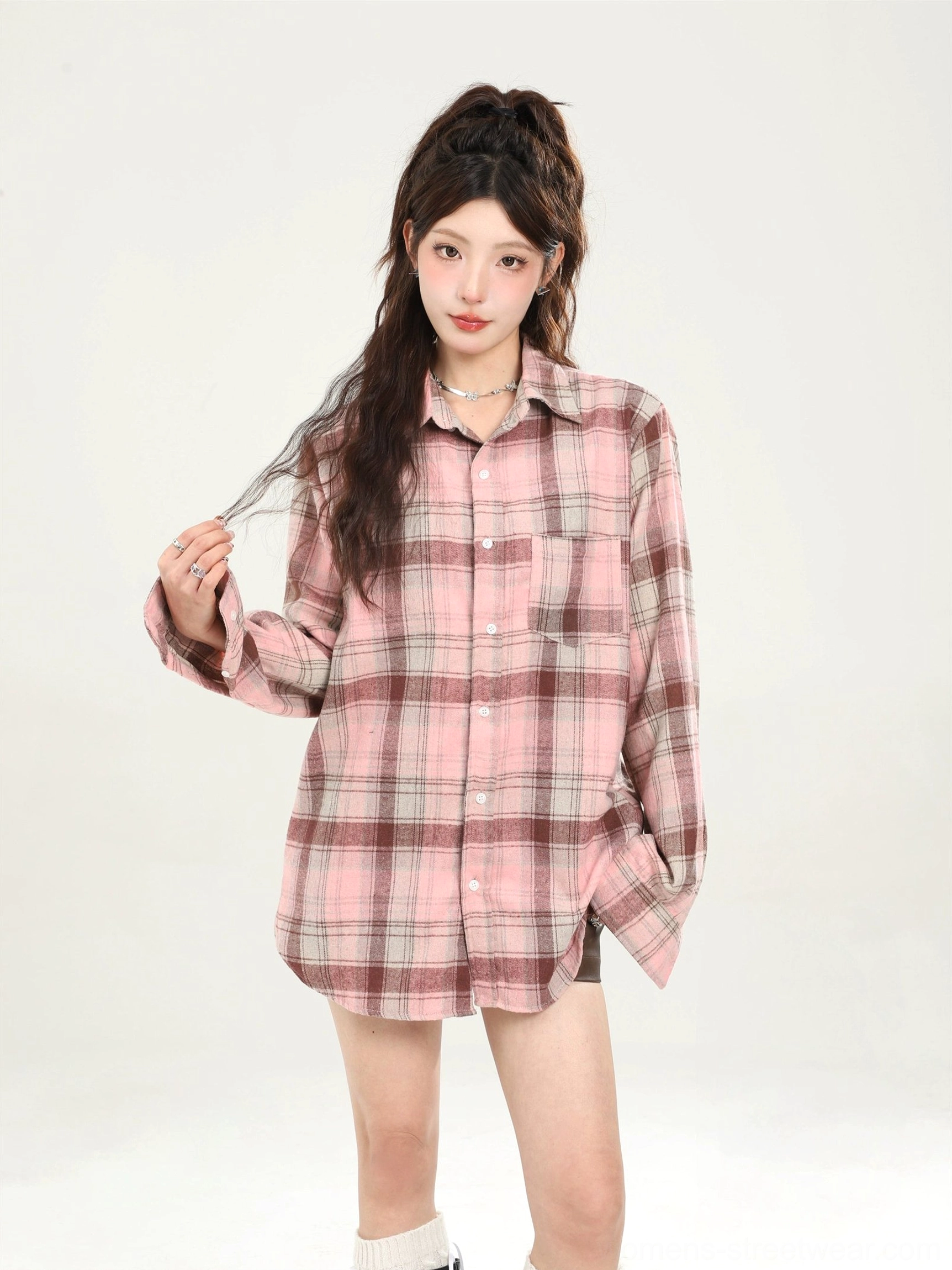 Pink plaid oversized button-down shirt front portrait showing relaxed collar and chest patch pocket