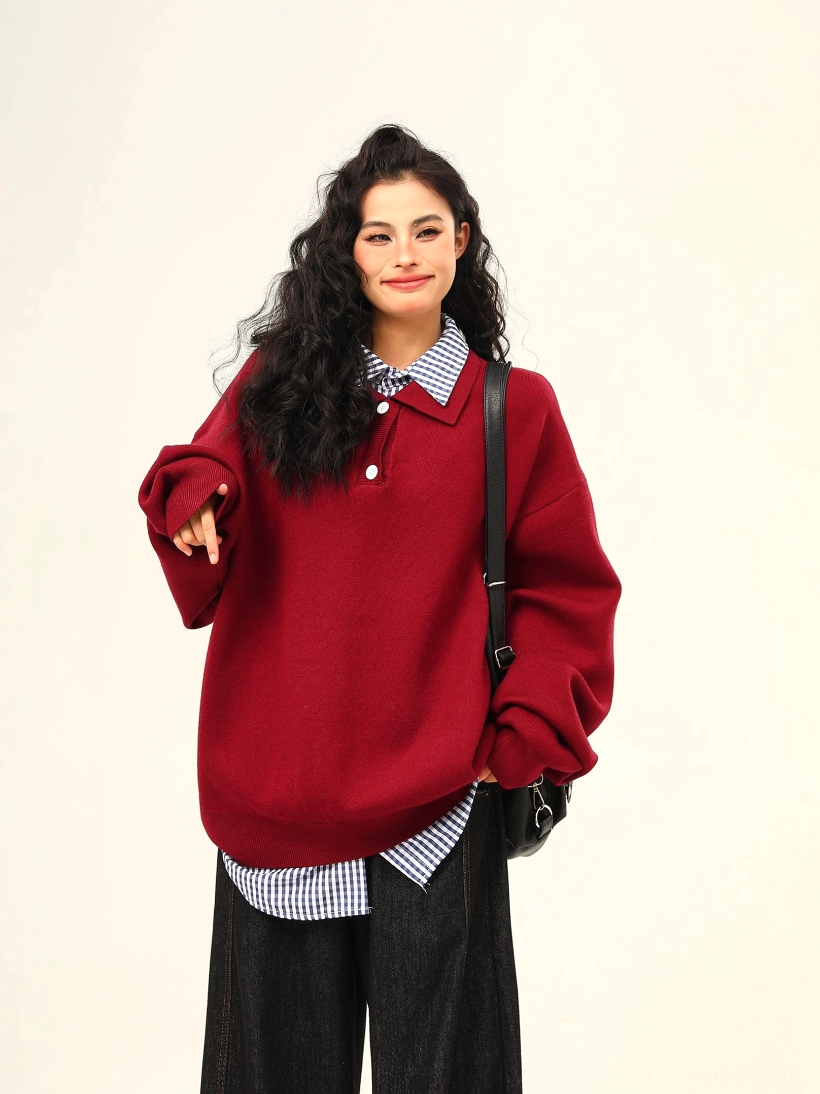 Wine red oversized polo collar knit sweater with drop shoulders and gingham shirt layering in a full front streetwear outfit