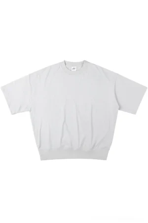 Light gray oversized relaxed fit sweater tee with ribbed crew neck, dropped shoulders, and loose Korean streetwear silhouette