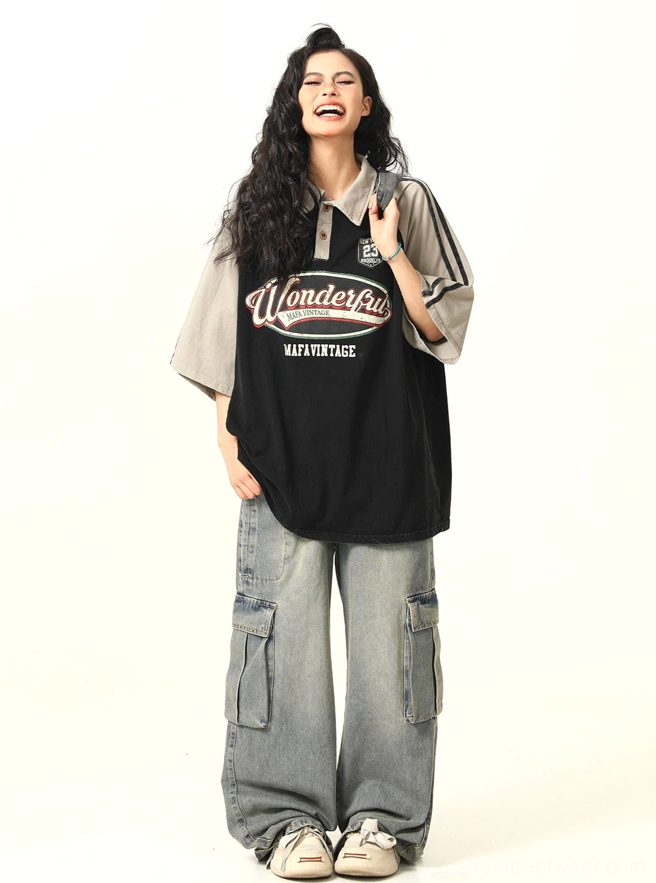 Oversized retro graphic polo shirt with Wonderful slogan print, contrast sleeves, casual sneakers, and relaxed East Asian streetwear styling
