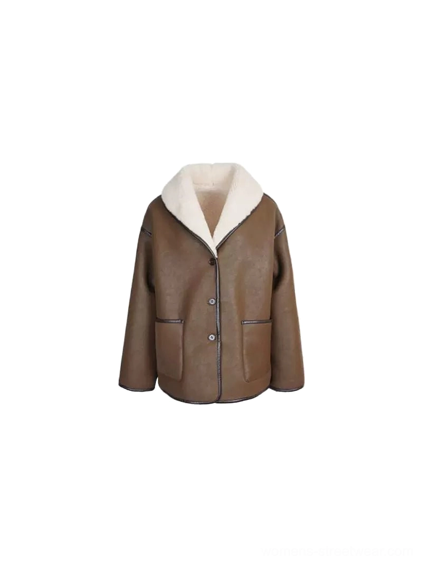 Flat lay of an oversized reversible sherpa button jacket with brown faux leather exterior, cream fluffy shearling collar, inner lining, front buttons, and two patch pockets