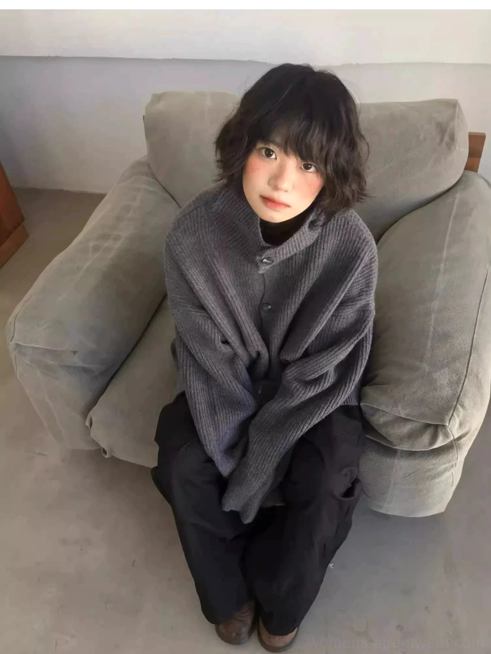 Oversized cardigan sweater with ribbed texture and versatile button front for black and gray streetwear outfits