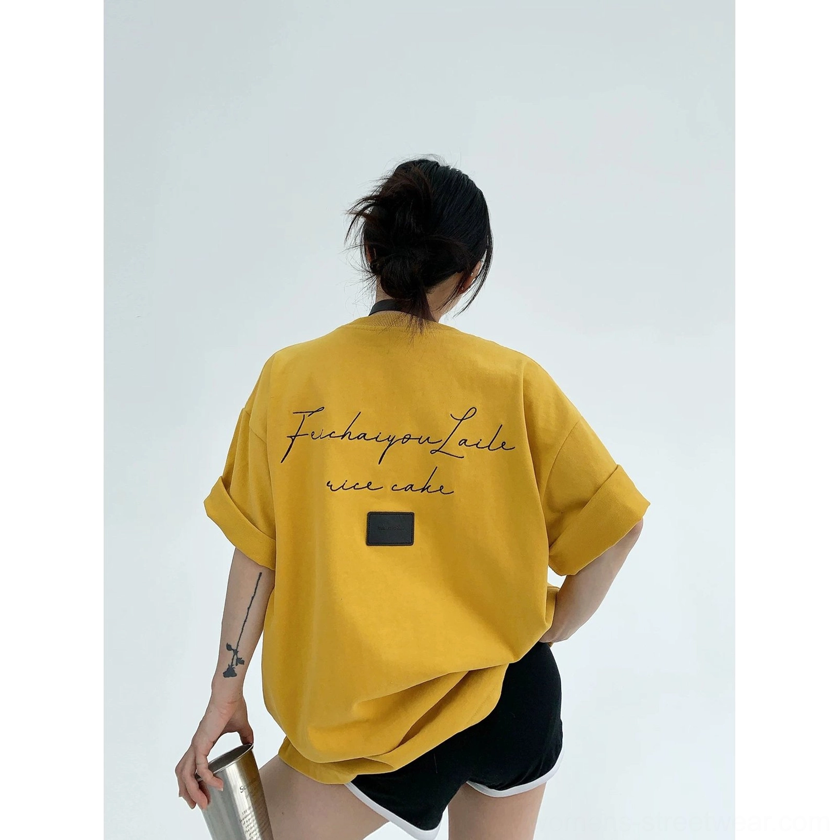 Oversized script backdrop Korean streetwear cotton T-shirt product image showing relaxed boxy fit and expressive back graphic detail