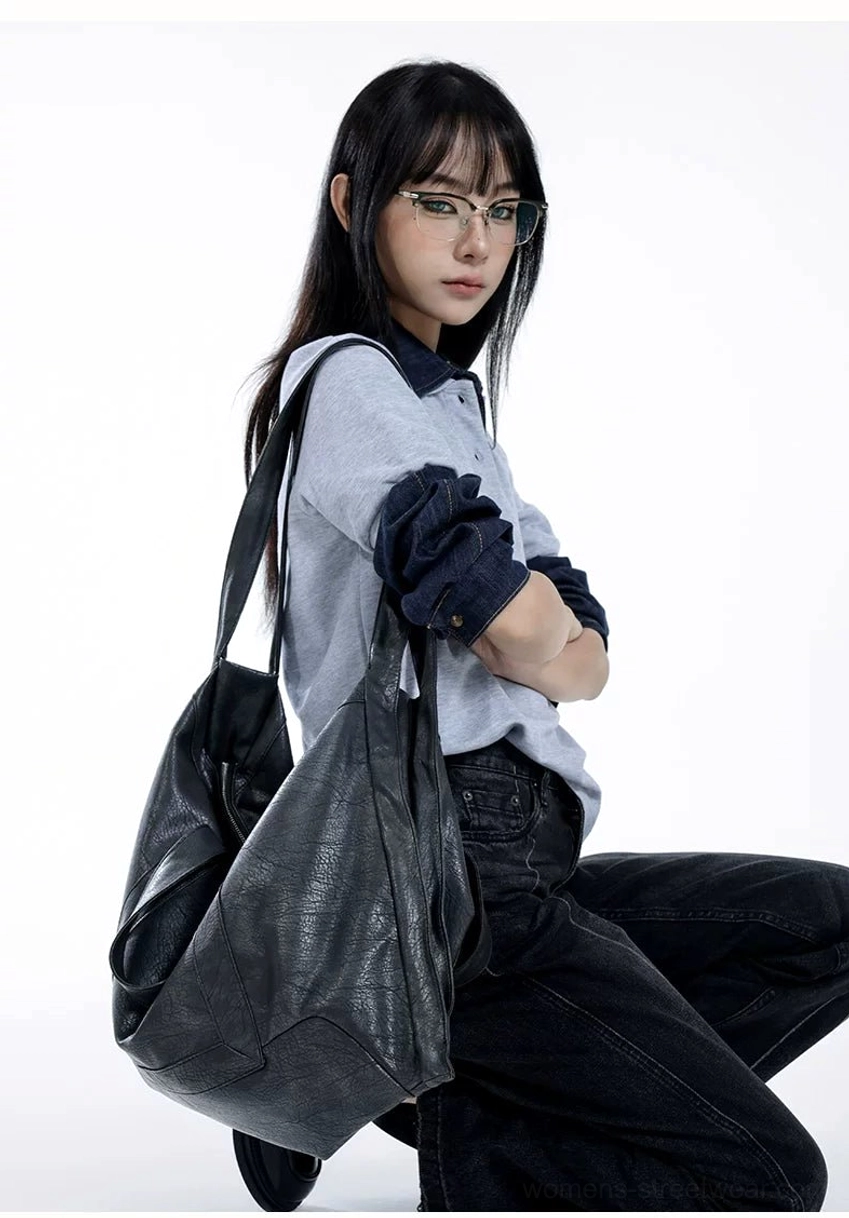 Oversized Shadow Drape slouchy shoulder tote bag showing pebbled matte faux leather texture and long strap