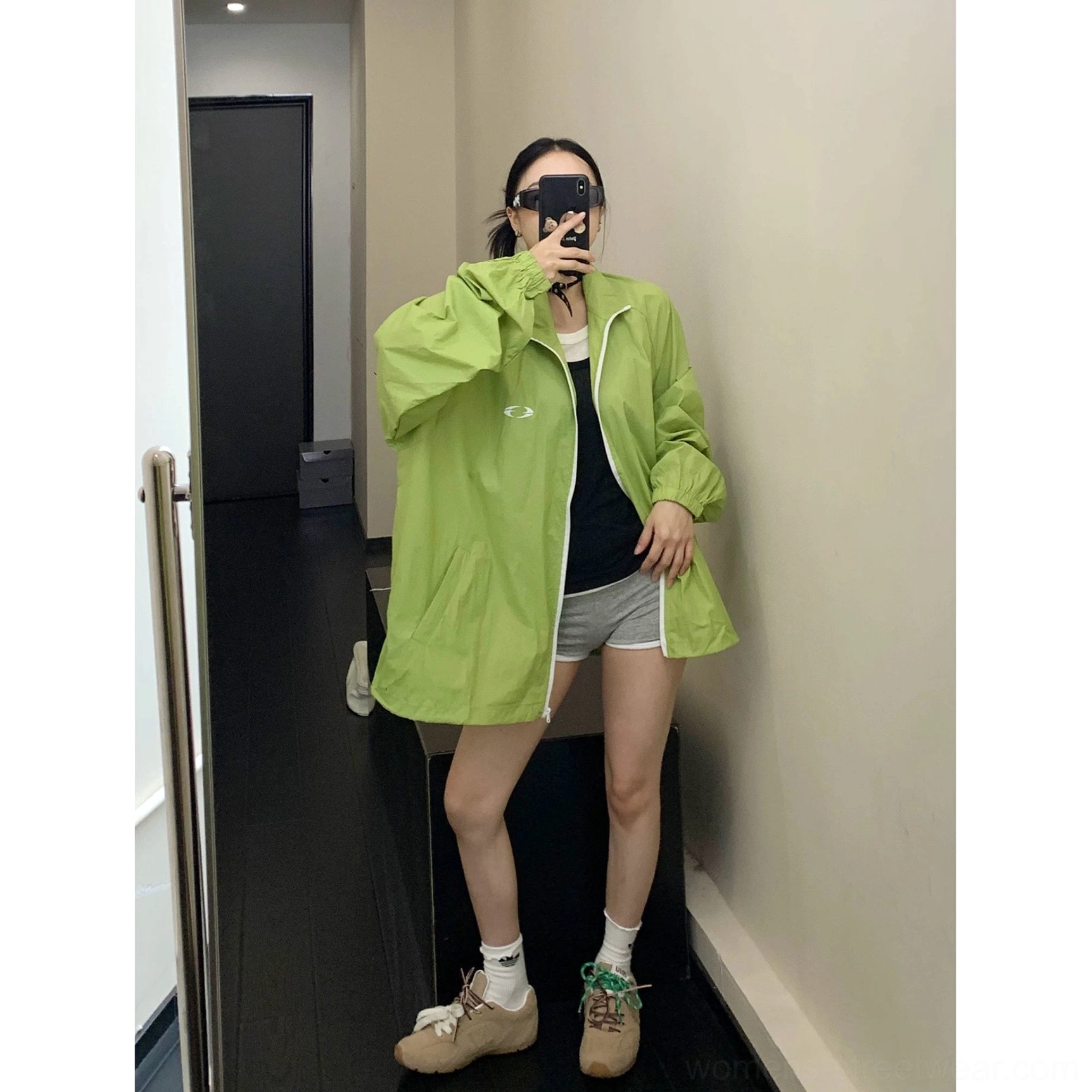 Oversized streetwear windbreaker jacket product image with breathable lightweight fabric, stand collar, elasticated cuffs, and versatile layering silhouette