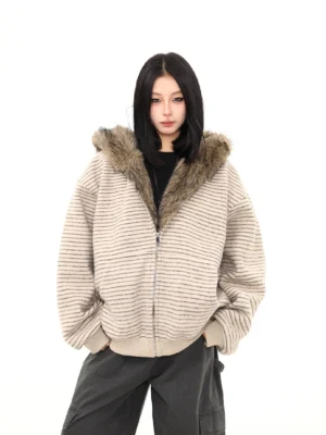 Front view of an oversized striped faux fur hooded jacket with ribbed hem cuffs full zip closure and front pockets