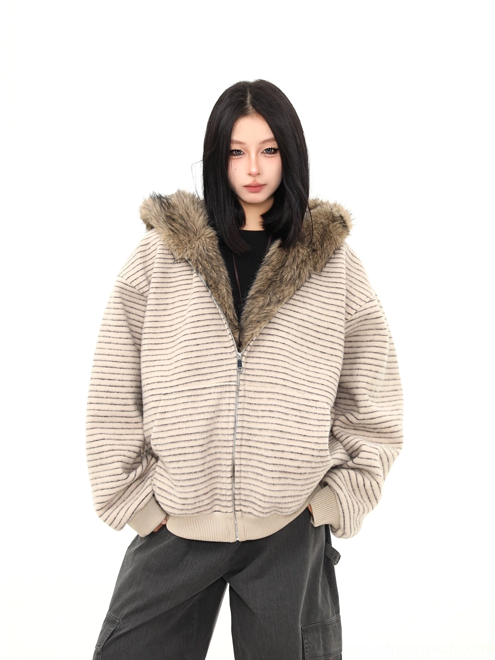 Front view of an oversized striped faux fur hooded jacket with ribbed hem cuffs full zip closure and front pockets