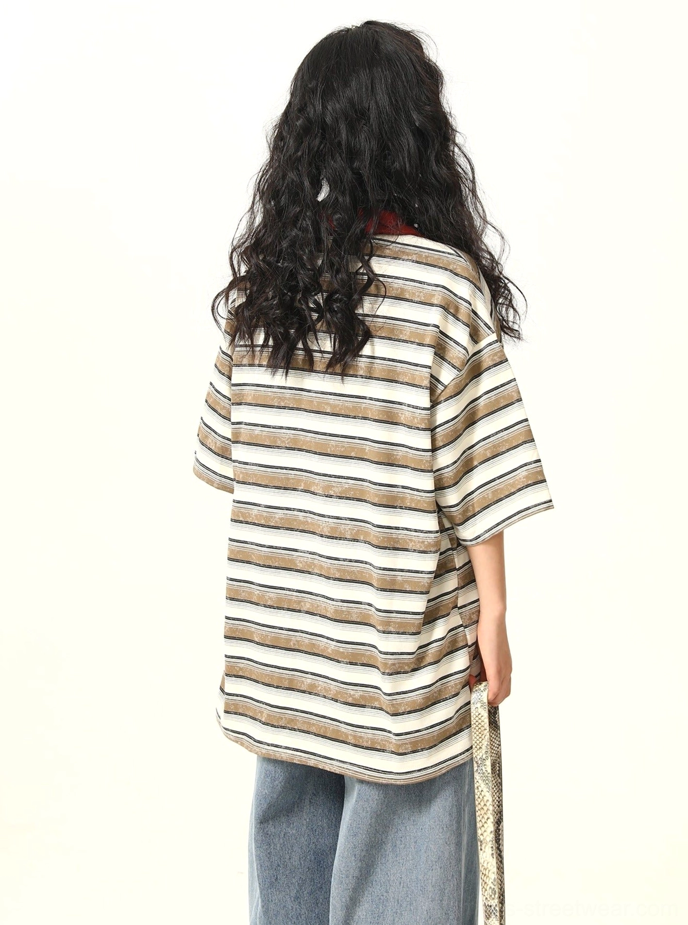 Back view of oversized striped lace-up rugby polo streetwear shirt with drop shoulders