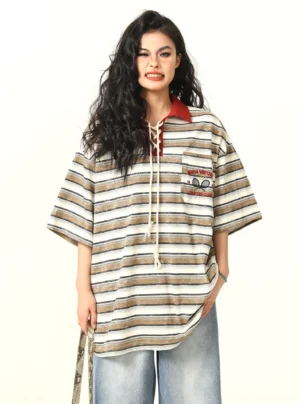 Oversized striped lace-up rugby polo shirt with contrast collar and embroidered chest badge