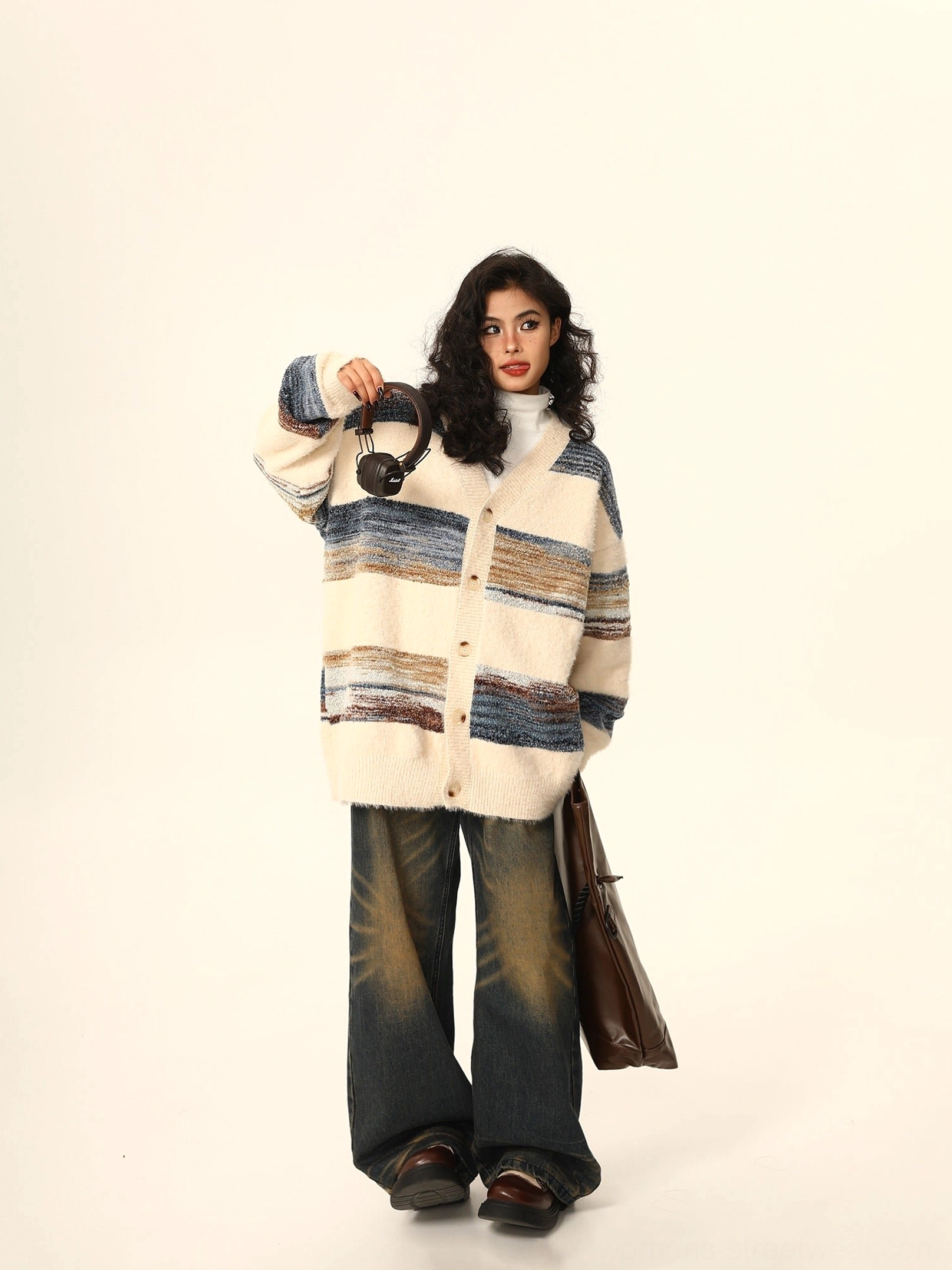 Oversized striped mohair cardigan back view styled with leather loafers and a shoulder tote for contemporary streetwear