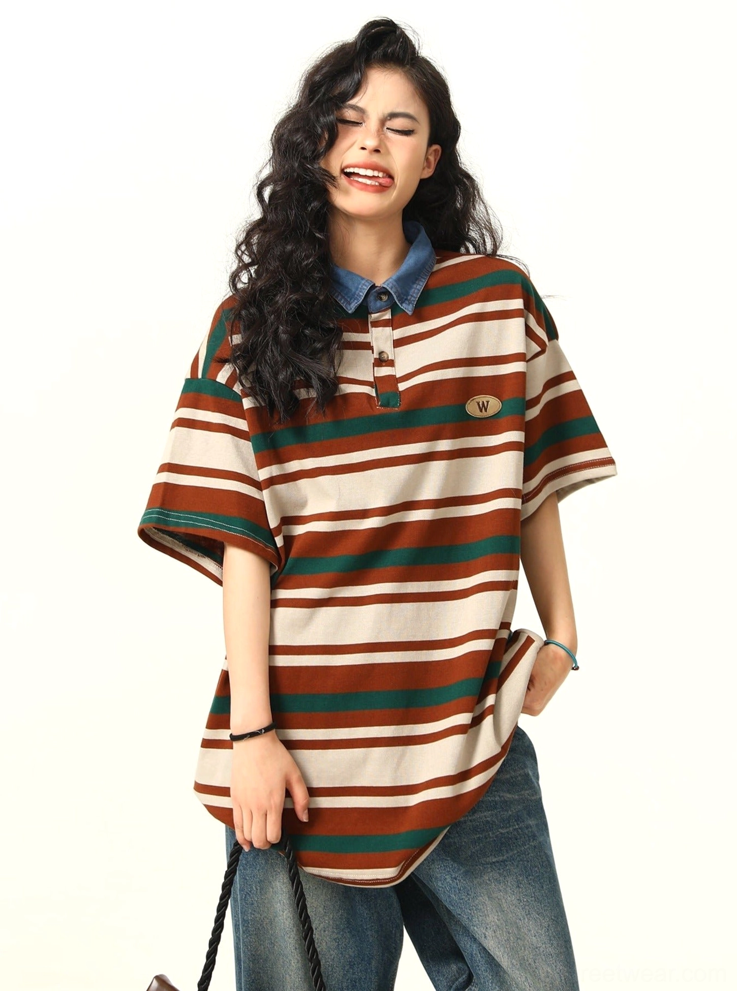 Loose fit striped polo shirt with denim collar half button neckline and side hem slit detail