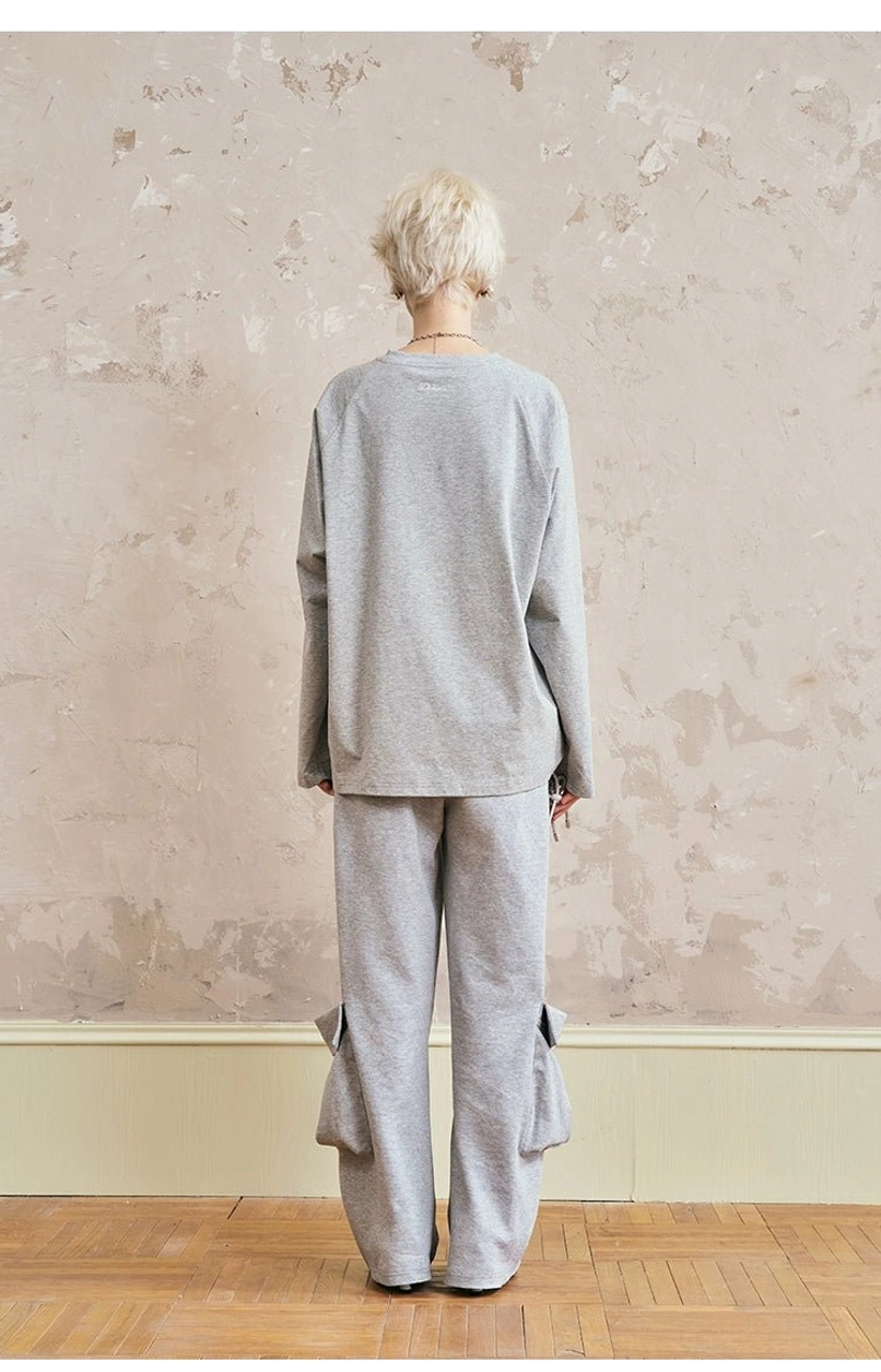 Back view of plain gray sweatshirt with matching cargo sweatpants - rear perspective showing side flap pockets