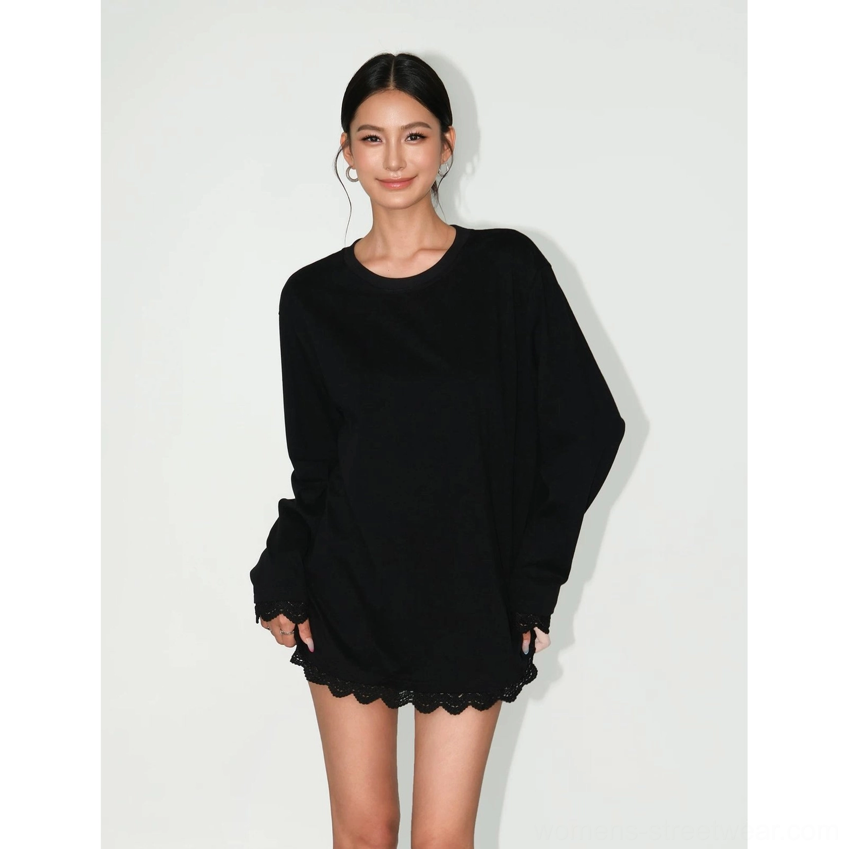 Contemporary oversized tee dress with long sleeves, scalloped lace hem, relaxed crew neck, and versatile Korean street style appeal