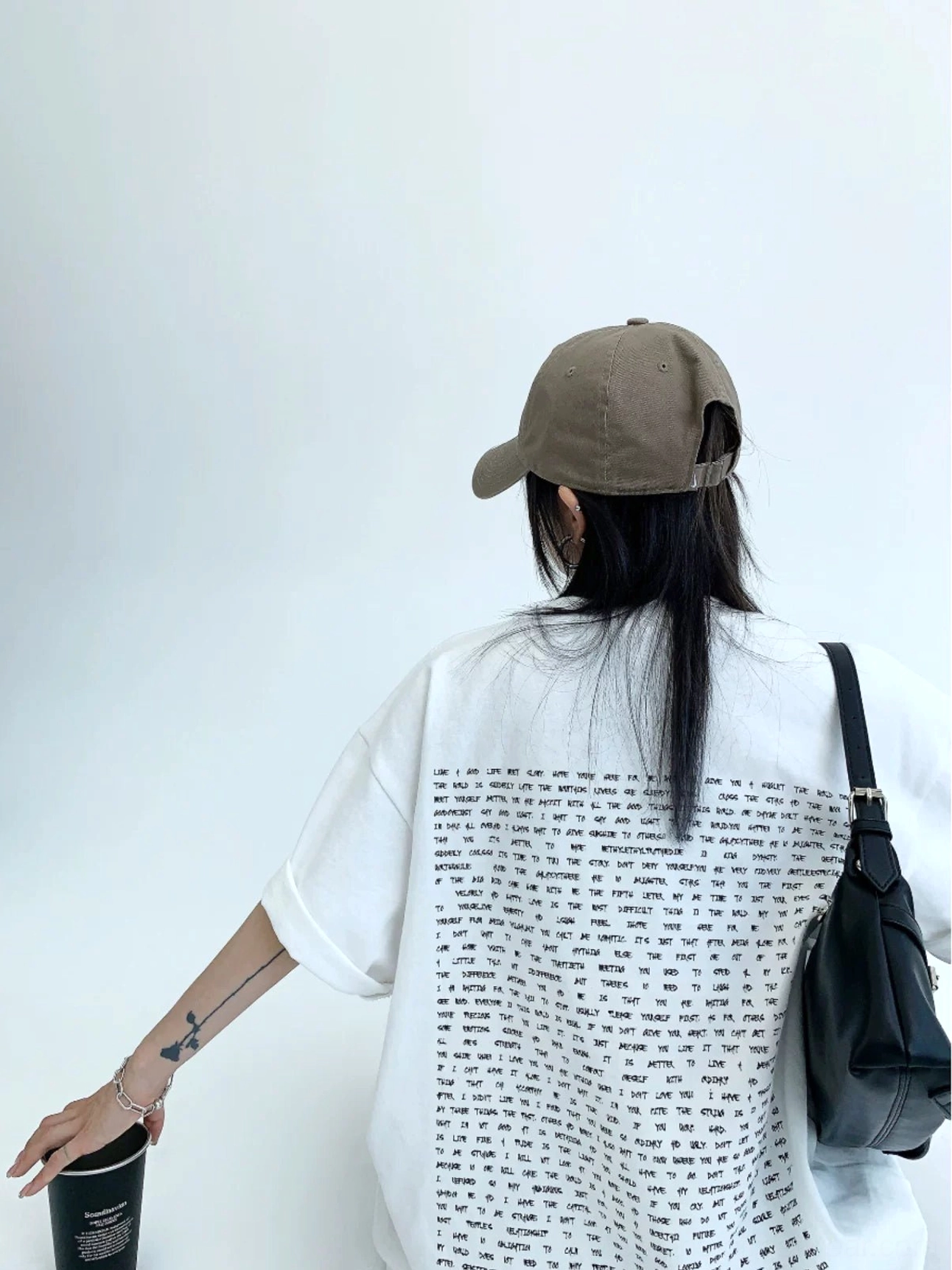White oversized typography back print cotton streetwear T-shirt with relaxed rolled short sleeves