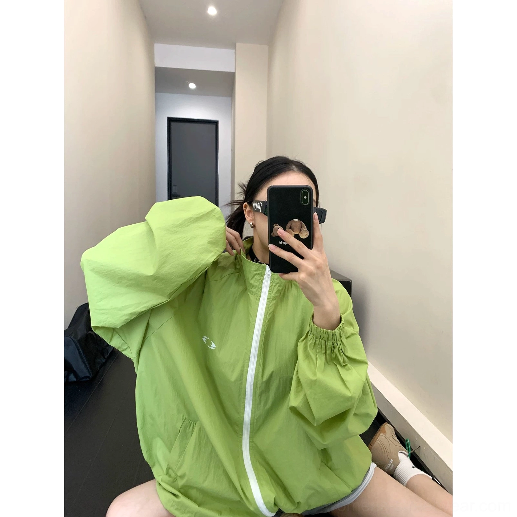 Oversized UPF50+ windbreaker jacket product image featuring lightweight woven polyester, high stand collar, full zip closure, and Korean streetwear styling