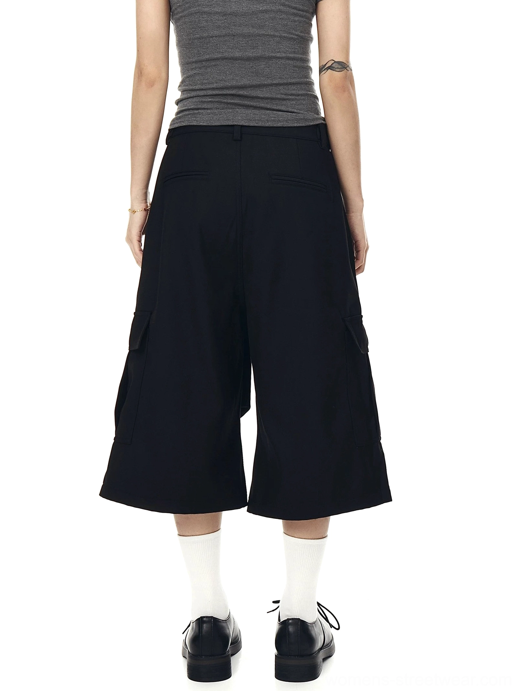 Oversized utility cargo culotte shorts in a clean Seoul streetwear silhouette with wide cropped legs and functional side pockets