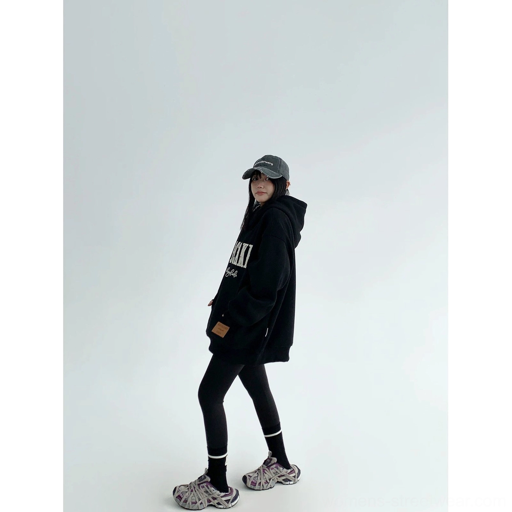 Oversized varsity graphic heavyweight fleece hoodie with relaxed streetwear silhouette and layered front lettering