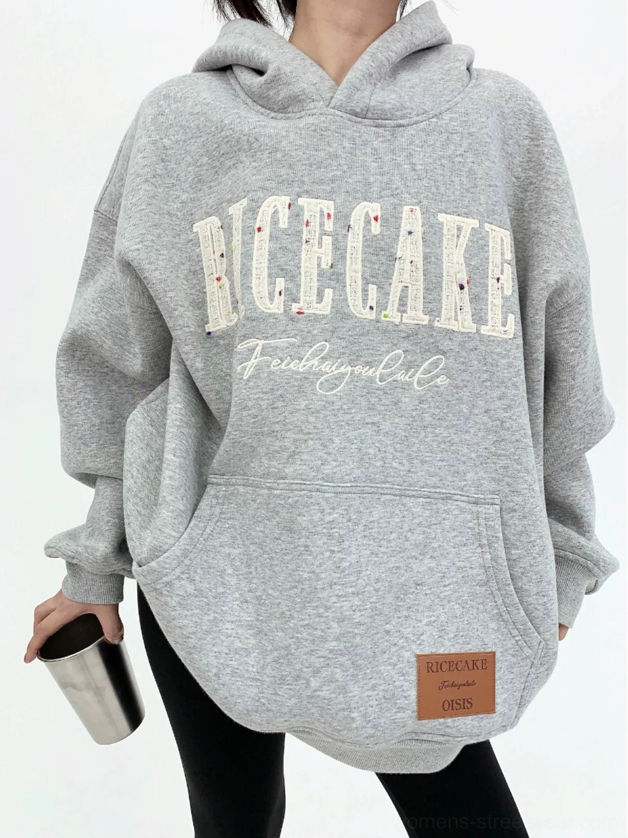 Heather gray oversized varsity graphic hoodie with heavyweight cotton fleece, kangaroo pocket, layered front lettering, and faux-leather hem patch