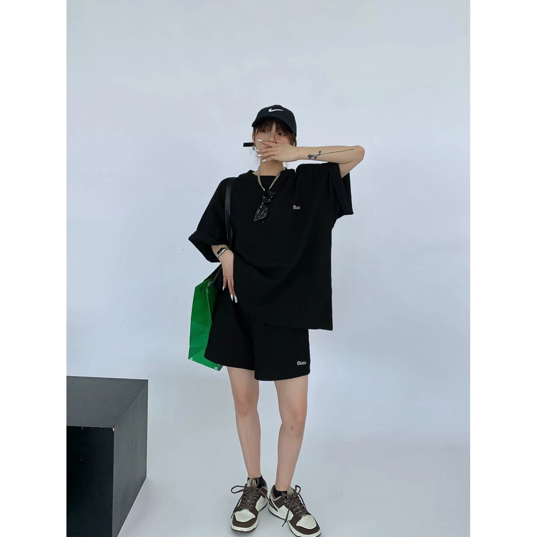 Full body black oversized waffle knit T-shirt and shorts streetwear lounge set with rolled sleeves
