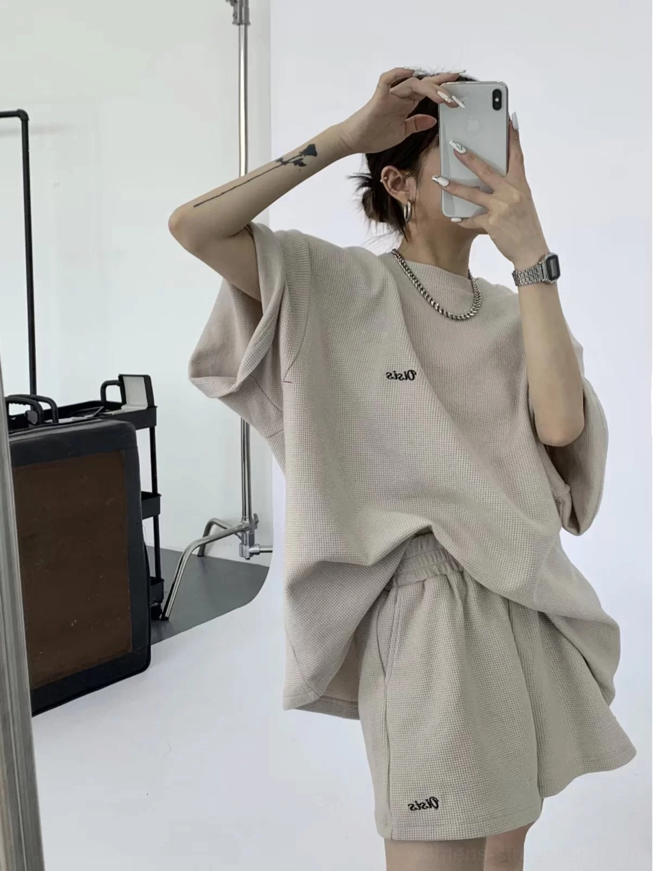 Back view of sand oversized waffle knit T-shirt and shorts streetwear lounge set