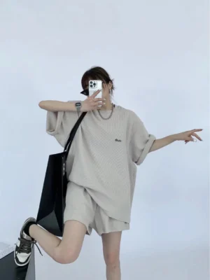 Sand textured knit oversized T-shirt and shorts matching lounge set three-quarter side view