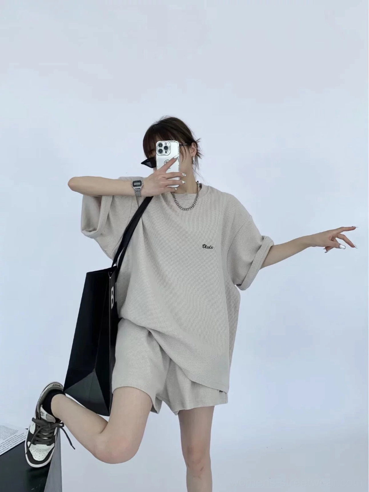 Sand textured knit oversized T-shirt and shorts matching lounge set three-quarter side view