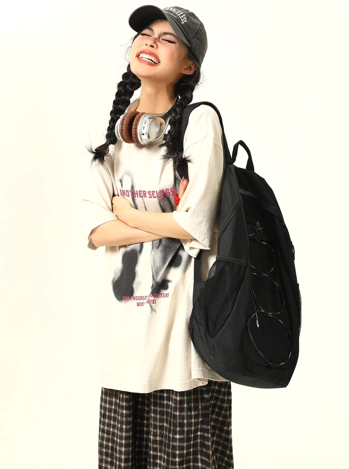 Apricot washed oversized handprint graphic T-shirt with faded slogan print in Korean streetwear styling