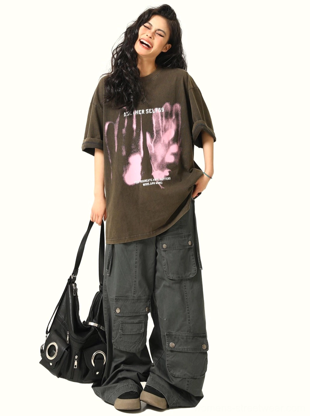 Black washed handprint grunge graphic T-shirt styled as an oversized women's streetwear outfit