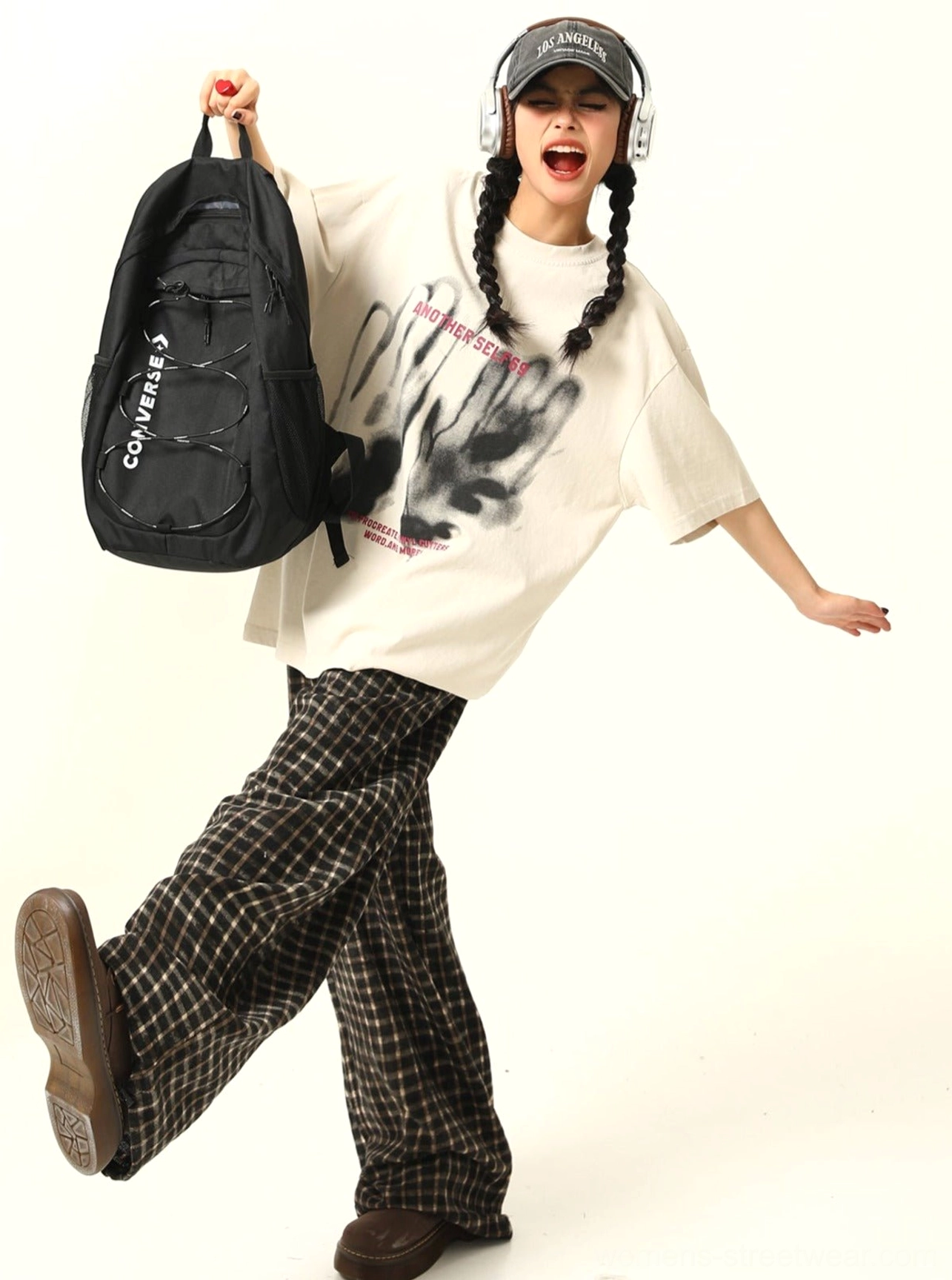 Oversized washed handprint grunge graphic T-shirt product image showing casual drop shoulder silhouette