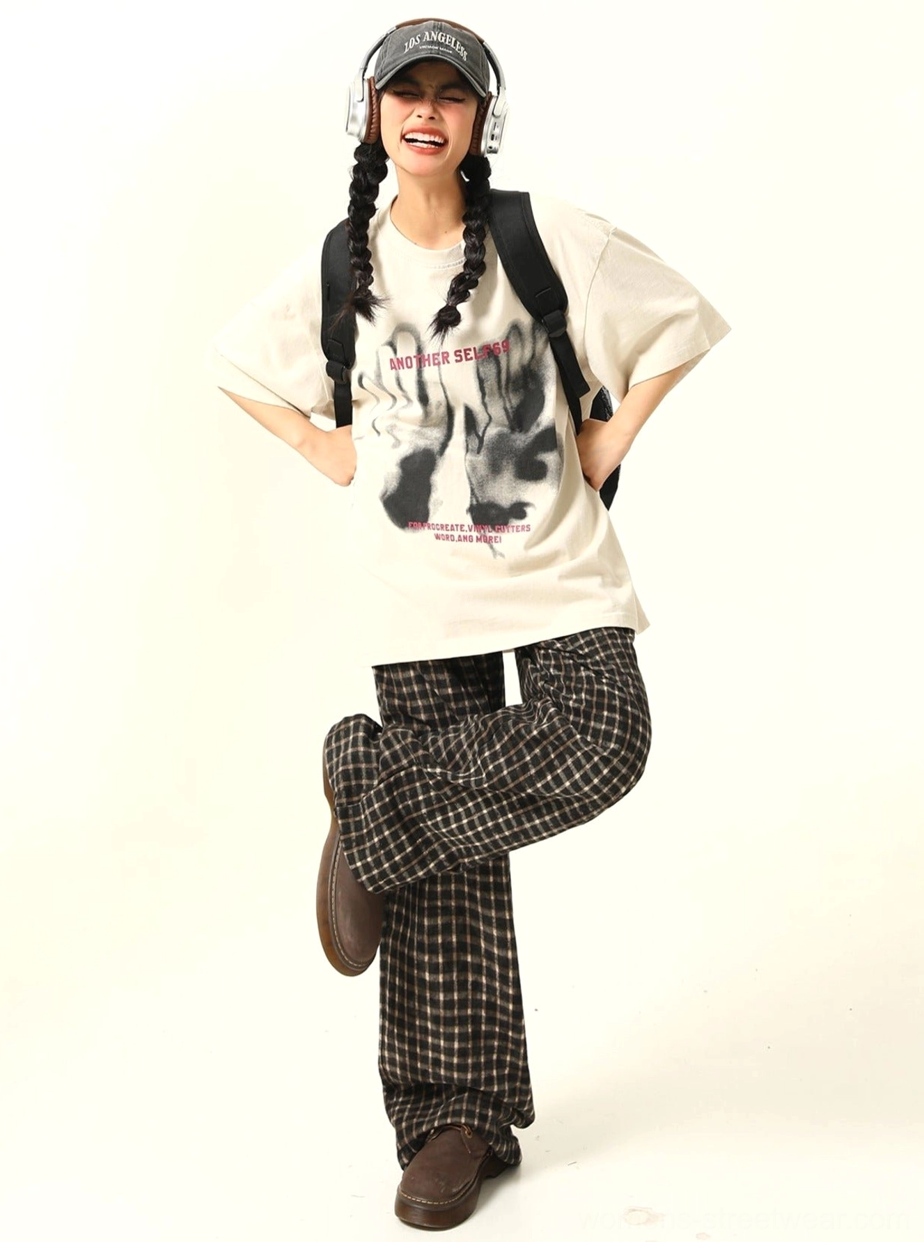 Oversized washed handprint grunge graphic T-shirt product image highlighting faded vintage-inspired print