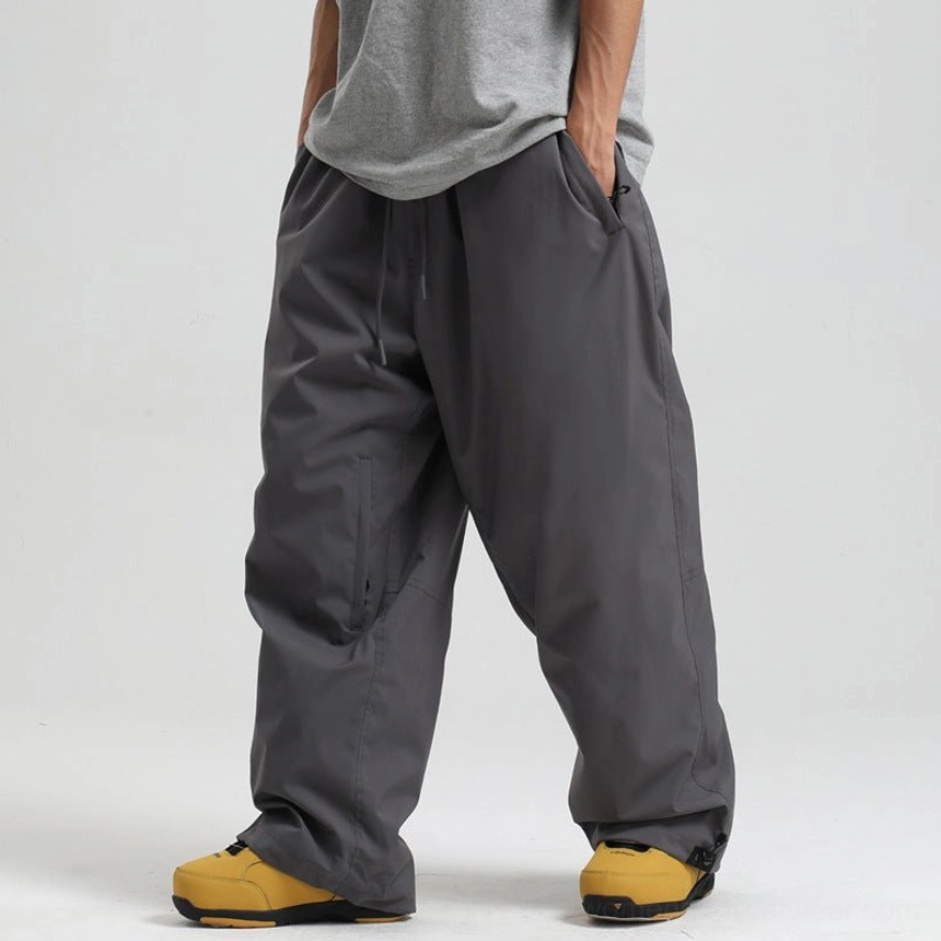 Dark grey wide leg waterproof snow pants with elastic drawstring waist and zip side pocket