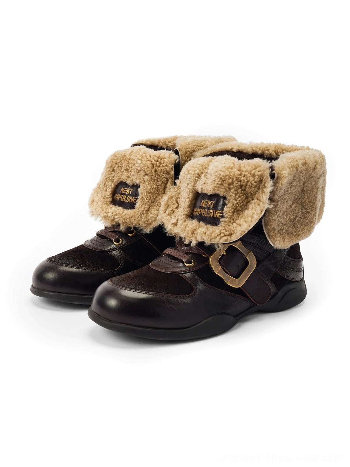 Pair of dark brown leather western ankle boots with tan shearling cuffs, laces, and buckle straps