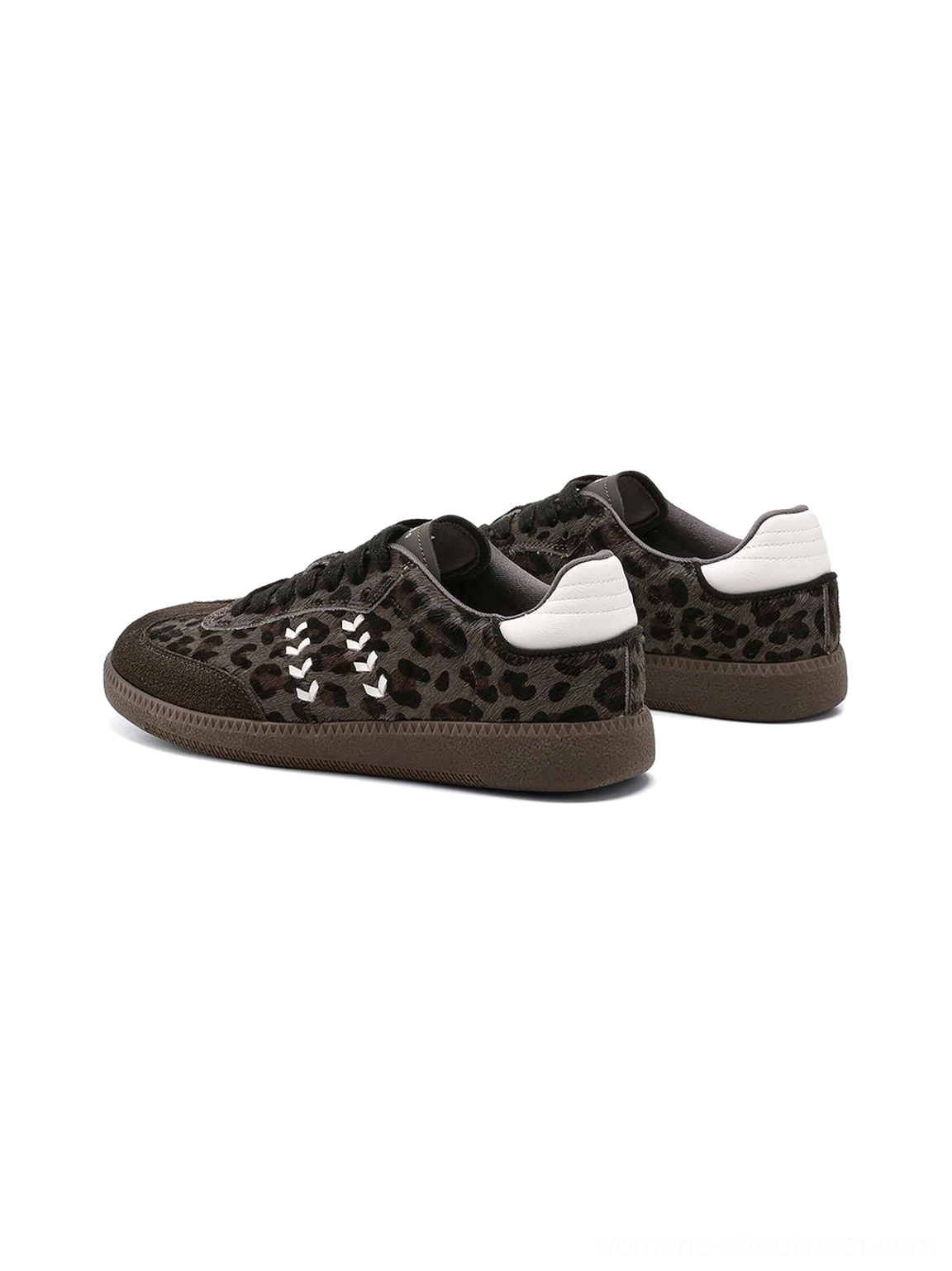 Pair of forest leopard print low top sneakers displayed on a white background with dark textured uppers, white heel tabs, contrast stitching, and brown gum soles