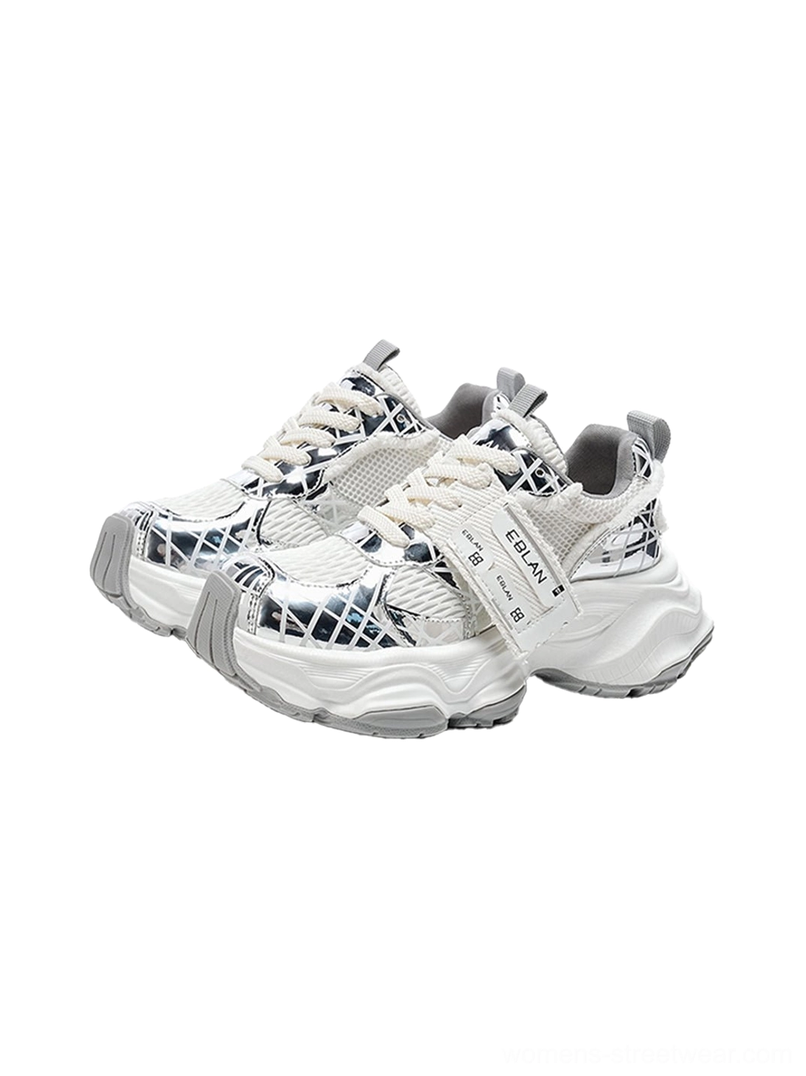 Pair of matching metallic silver mesh tech runner sneakers with aligned adjustable straps, breathable layered uppers, chunky rubber soles, and coordinated futuristic design