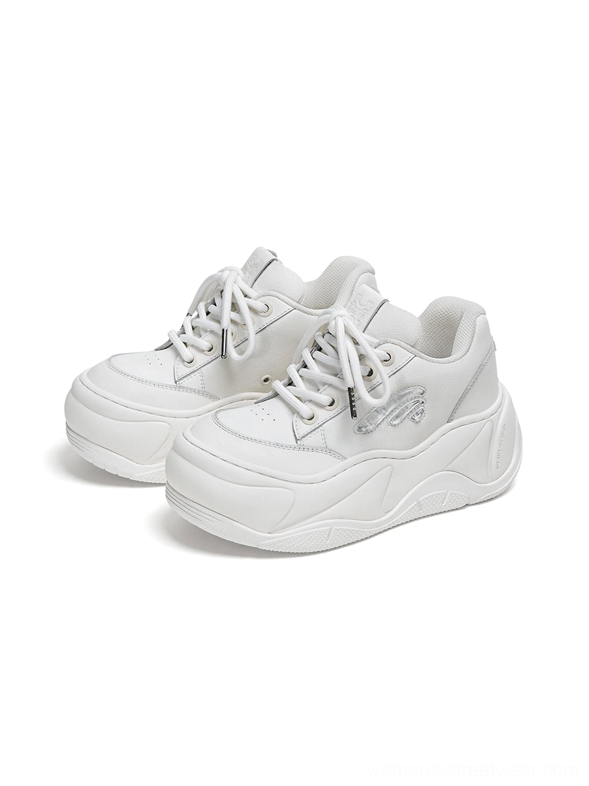 Pair of white chunky platform sneakers shown from a front three-quarter angle with side logo details and wave outsole