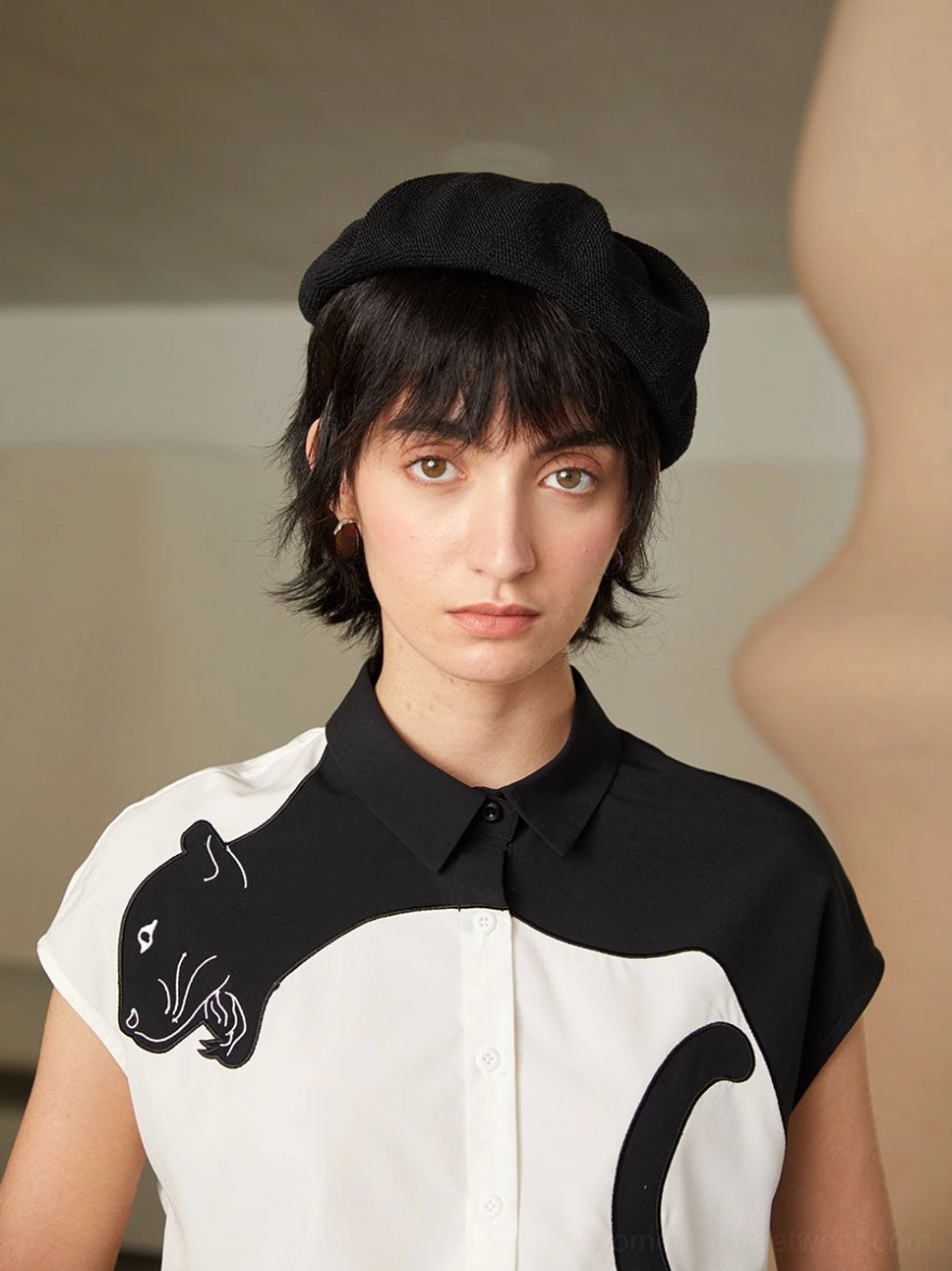 Panther embroidered blouse product image featuring a bold animal motif and modern button-down styling