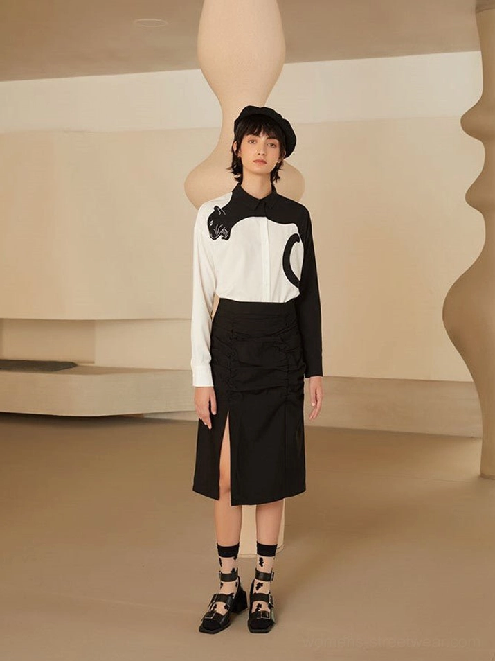 Panther embroidery blouse product image with bold graphic contrast and polished shirt-inspired styling