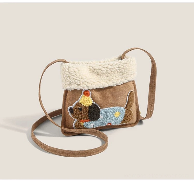 Brown and khaki party pup sherpa faux suede mini crossbody bag front three-quarter view with embroidered puppy patch