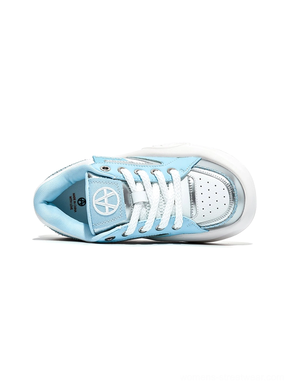 Top-down view of pastel breathable platform runner sneaker showing inner lace area mesh ventilation and cushioned construction