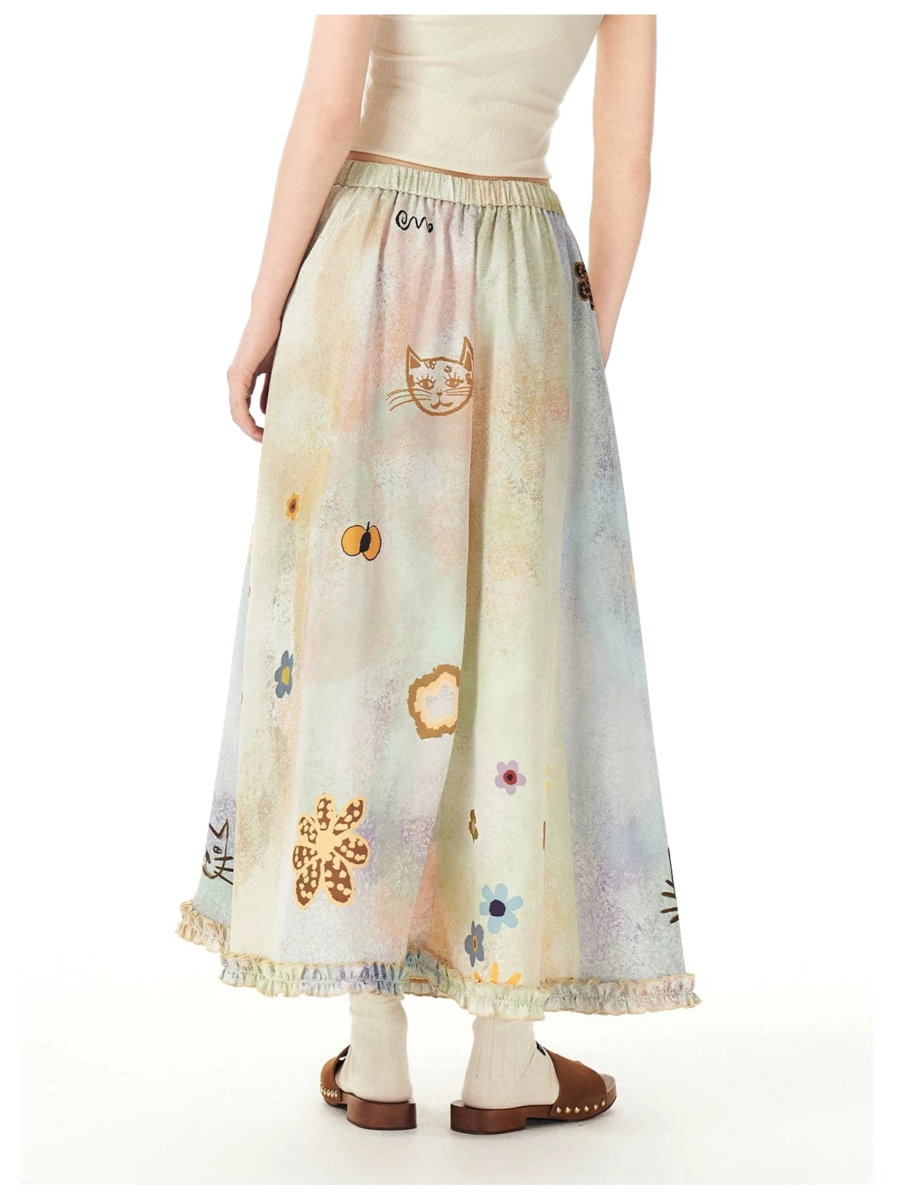 Rear view of a pastel cat garden maxi skirt with watercolor gradient print, floral kitty illustrations, elastic high waist, and ruffled hem