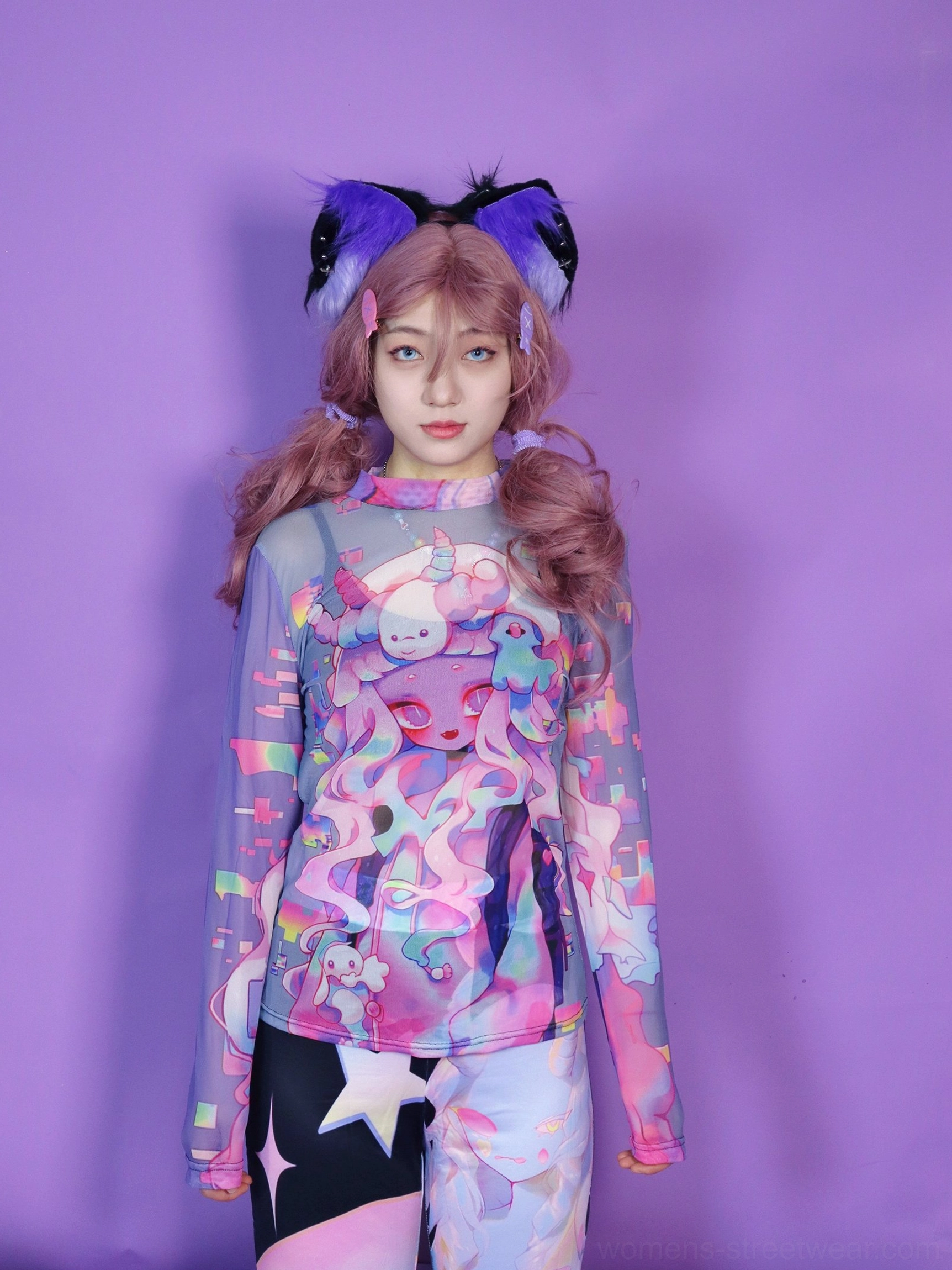 Pastel cyber cartoon mesh long sleeve Y2K top worn in a front full body view against a purple studio background