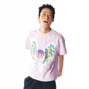 Lavender purple pastel fairy graphic cotton streetwear tee worn by male model in front studio view